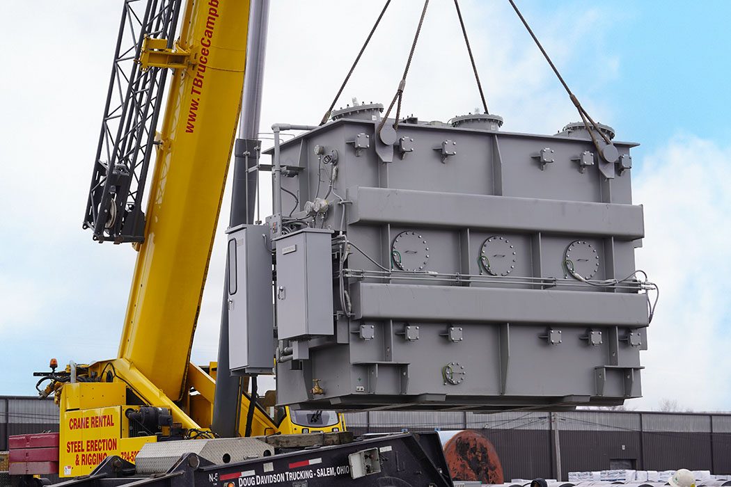 Industrial-grade transformer prepared for a manufacturing facility